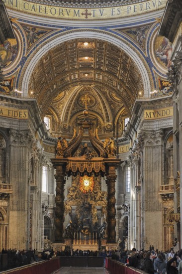 View through bronze canopy by Gian Lorenzo Bernini under dome of St Peter's Basilica, behind it apse main apse with larger-than-life replica of throne Cathedra Petri bronze reliquary for wooden chair Saint chair of first pope allegedly chair of Simon Peter, St Peter's Basilica, Vatican City, Vatican, Rome, Italy, Europe
