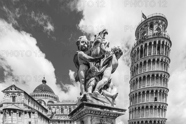 Statue with angels, behind the Cathedral of Santa Maria Assunta and the Leaning Tower, black and white photograph, Pisa, Tuscany, Italy, Europe