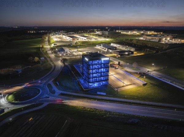 Illuminated building in a city at night, taken from a bird's eye view, Mobex, Nagold, Black Forest, Germany, Europe