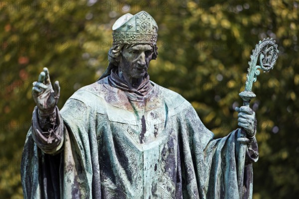 Bernward of Hildesheim, statue by Ferdinand Hartzer in the cathedral courtyard in Hildesheim, Lower Saxony, Germany, Europe