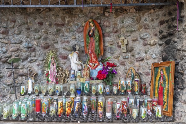 Chimayo, New Mexico, Prayer candles at El Santuario de Chimayo, a Roman Catholic pilgrimage shrine in the mountains of northern New Mexico