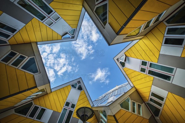 ROTTERDAM, NETHERLANDS, MAY 11, 2017: Cube houses, innovative cube-shaped houses designed by architect Piet Blom with idea to optimize space in Rotterdam, Netherlands now became a tourist attraction