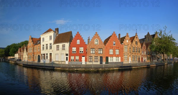 Typical Belgian cityscape Europe tourism concept, panorama of canal and old houses on sunset. Bruges (Brugge), Belgium, Europe
