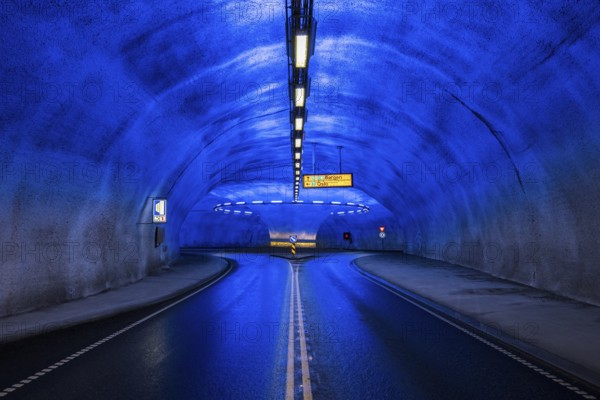 Blue illuminated roundabout in tunnel, Eidfjord, Hardangerfjord, Norway, Europe