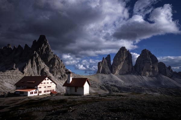Stormy atmosphere, view of the Three Peaks Hut, chapel, Paternkofel, Three Peaks, South Tyrol, Trentino, Sesto Dolomites, Italy, Europe
