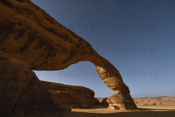 Starry sky above The Arch, also known as Rainbow Rock, near AlUla, Medina Province, Saudi Arabia, Arabian Peninsula, Asia