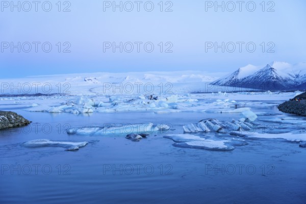 Beautiful sunrise view of Jokulsarlon ice lake at night in winter. Iceland