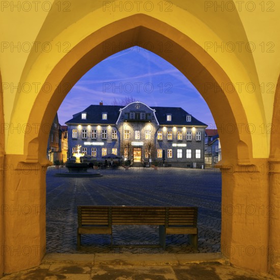 View from the open hall of the late Gothic town hall in Goslar in the evening onto the market square with the Kaiserringhaus, UNESCO World Heritage Site, Lower Saxony, Germany, Europe