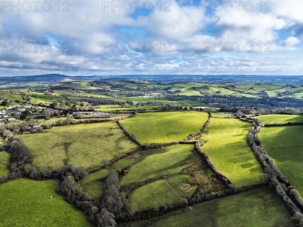 Farms over Morcombelake Village from a drone, Bridport, Dorset, England, United Kingdom, Europe