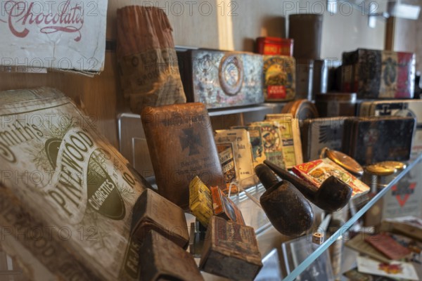 Personal belongings like cigarettes of British and German WW1 soldiers in the Memorial Museum Passchendaele 1917 at Zonnebeke, West Flanders, Belgium, Europe