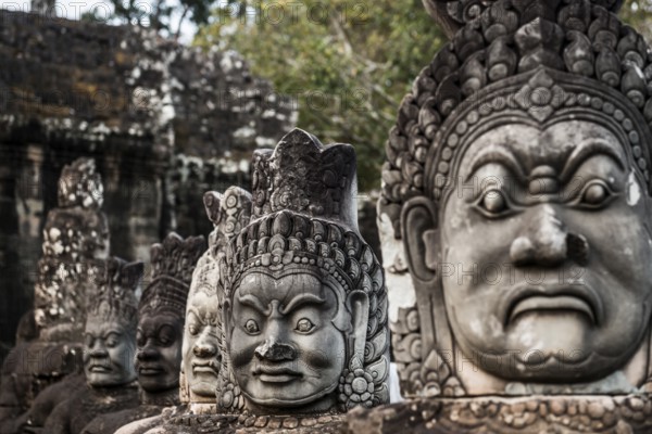 Figures on the bridge to Angkor Thom, sunset, Angkor Wat, Angkor, UNESCO World Heritage Site, Siem Reap, Cambodia, Indochina, Southeast Asia, Asia