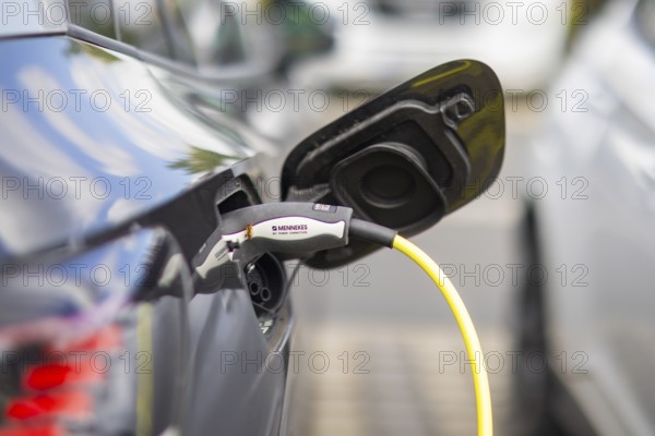Electric cars at charging stations, Dresden, Saxony, Germany, Europe