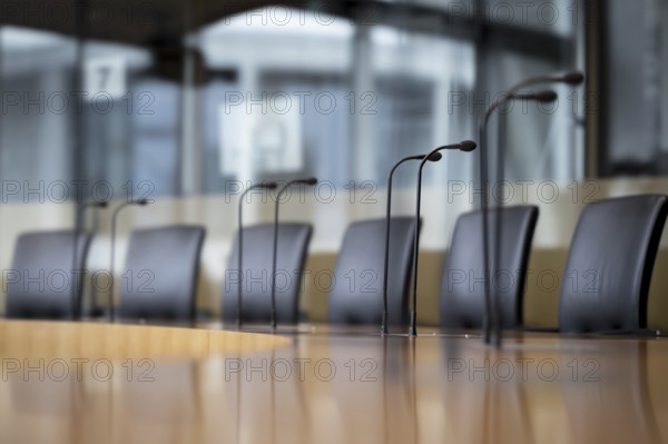 Microphones and seats in a hearing room in the Marie-Elisabeth-Lüders-Haus