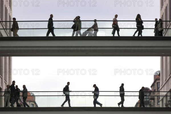 Families cross a bridge with their children into the Mall of Berlin shopping centre, 25/09/2014, Berlin, Berlin, Germany, Europe