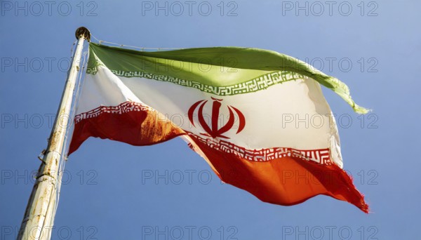 Flag, the national flag of Iran flutters in the wind
