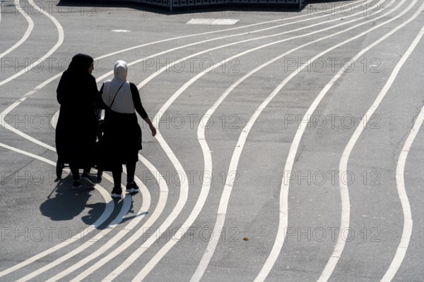 The Nørrebro district in Copenhagen, lively, multicultural and student neighbourhood, Superkilen Park, Den Sorte Plads, square designed with white lines, playgrounds, cultural facilities, sports equipment, cycle path, Denmark, Europe