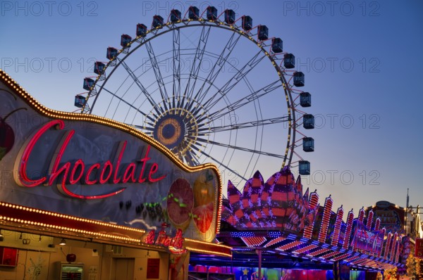 Ferris wheel, Europa Rad, rides, stall, advertising, confectionery, movement, motion effect, neon lighting, Cannstatter Wasen, blue hour, folk festival, Bad Cannstatt, Stuttgart, Baden-Württemberg, Germany, Europe
