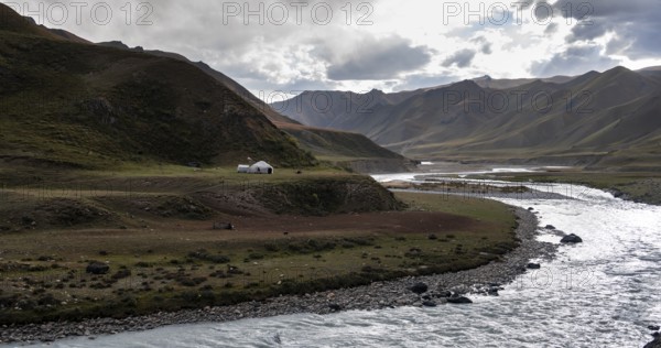 Yurt by a river, Desolate mountain landscape, Tian Shan, Sky Mountains, Sary Jaz Valley, Kyrgyzstan, Asia