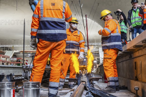 The last rails are being welded at the new main station. All the rails are now in place between Feuerbach and Wendlingen. The last gaps between the rails have been closed using the Thermit welding process. The infrastructure project is scheduled to go online at the end of 2026. Deutsche Bahn estimates the total cost of Stuttgart 21 at around eleven billion euros. Stuttgart, Baden-Württemberg, Germany, Europe