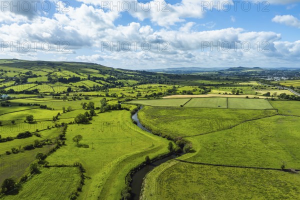 Farms and Fields over Cononley and River Aire from a drone, Keighley, North Yorkshire, England, United Kingdom, Europe