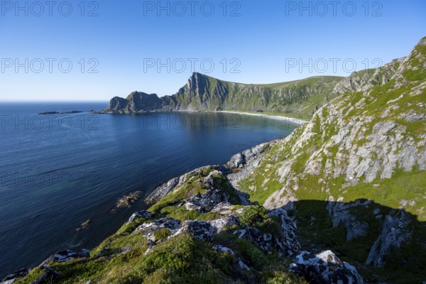 View of coastal landscape, cliffs with peak Måtind, Høyvika beach and sea, hike to the peak of Måtind, Andøya island, Vesterålen, Nordland Norway
