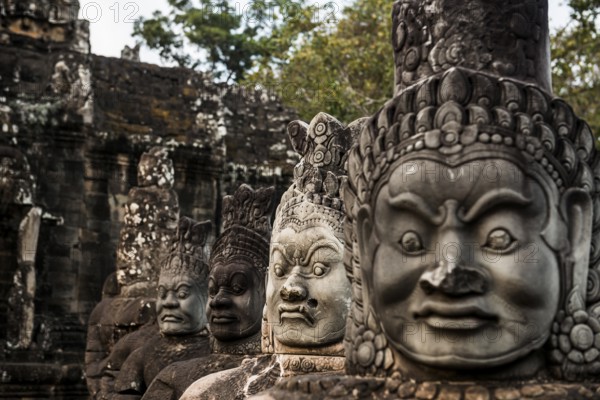 Figures on the bridge to Angkor Thom, sunset, Angkor Wat, Angkor, UNESCO World Heritage Site, Siem Reap, Cambodia, Indochina, Southeast Asia, Asia