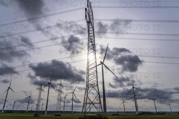 Wind farm, power line, high-voltage pylons, east of Bad Wünnenberg, OWL, North Rhine-Westphalia, Germany, Europe