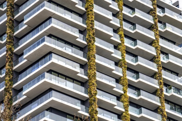 Facade of the Eden Tower on Europa-Allee in Frankfurt am Main, green facade, residential building, apartment building, Hesse, Germany, Europe