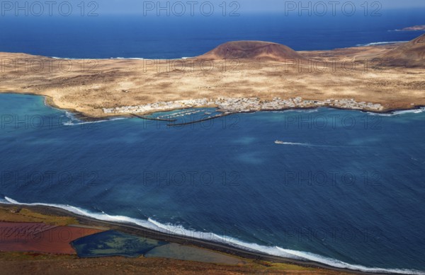 View from the Mirador del Río viewpoint, designed by artist César Manrique, of the island of La Graciosa, Lanzarote, Canary Islands, Canary Islands, Spain, Europe