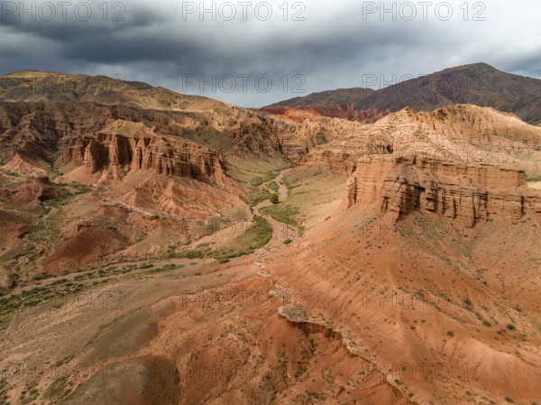 Eroded mountain landscape, canyon with red and orange rock formations, aerial view, Konorchek Canyon, Chuy, Kyrgyzstan, Asia