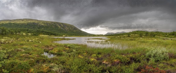 Rain clouds over a small lake near Börsjöhögruva, Panorama, landscape, Fjell, mountains, landscape photography, Alvdal, Tynset, Innlandet, Norway, Europe