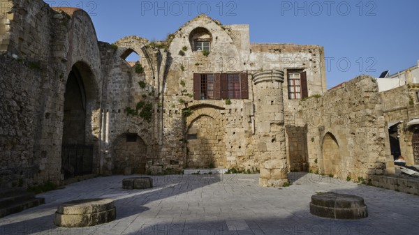 Church of the Holy Virgin of Burgh, Old historical ruins with stone arches and remains of traditional buildings, under blue sky, Rhodes Old Town, Rhodes Town, Rhodes, Dodecanese, Greek Islands, Greece, Europe