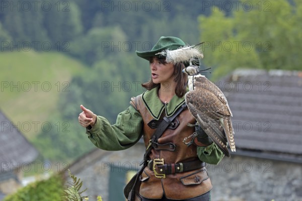 Female falconer at Hohenwerfen Castle, Salzburger Land, Austria, Europe