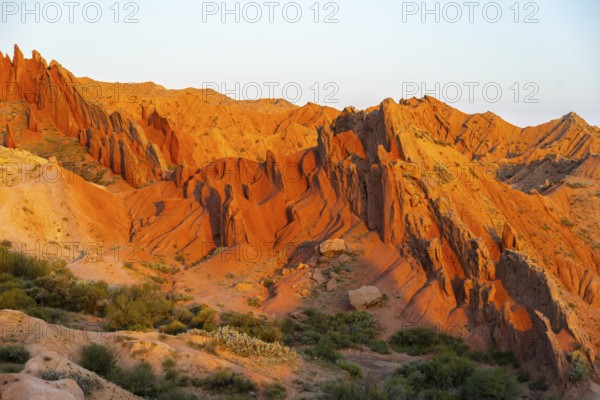 Red rocks, canyon of eroded sandstone formations, red and orange sandstone rocks, fairytale gorge, Skazka, Tosor, Kyrgyzstan, Asia