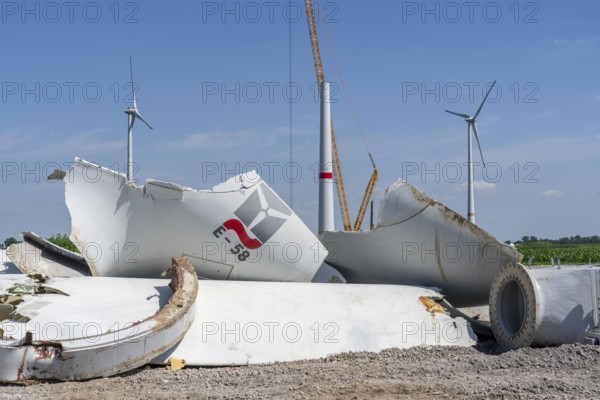 Repowering, dismantled Enercon E-58 wind turbine in a wind farm near Issum, 9 older wind turbines that have been in operation for over two decades are being replaced by a total of four Enercon E-160 turbines, under construction, with a total output of 22 megawatts, Lower Rhine, North Rhine-Westphalia, Germany, Europe