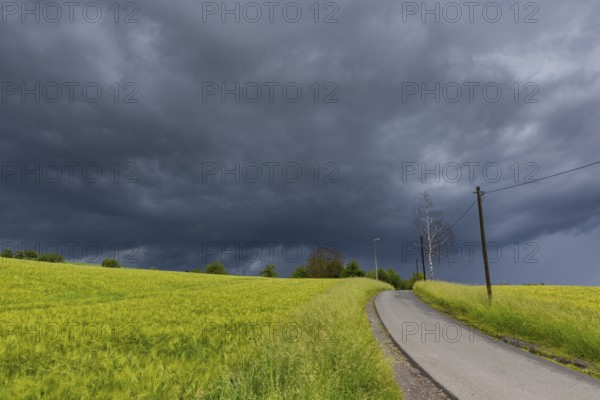 Heavy rain showers and thunderstorms over Possendorf in the Eastern Ore Mountains, Possendorf, Saxony, Germany, Europe