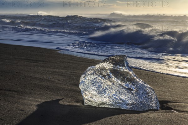 Ice floe on the beach, waves, sunny, morning mood, winter, Diamond Beach, Breidamerkursandur, Jökulsarlon, Iceland, Europe