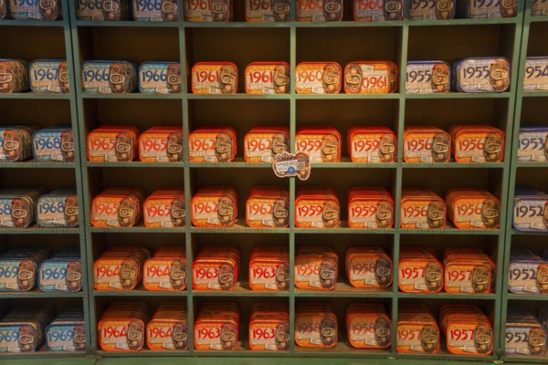 Shelves filled with a variety of colourful and artistically designed sardine tins that have a nostalgic charm, canned sardines, Óbidos, Obidos, Oeste, Centro, Estremadura, Portugal, Europe