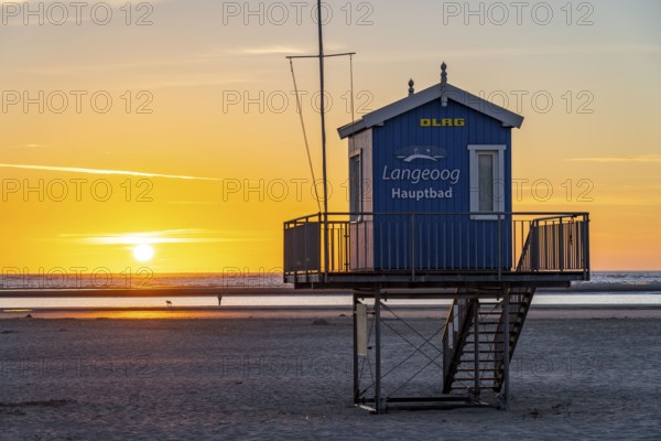 North Sea island of Langeoog, early summer, shortly after the first easing of the lockdown in the Corona crisis, still quite few tourists on the beach, DLRG watchtower, sunset, Lower Saxony, Germany, Europe
