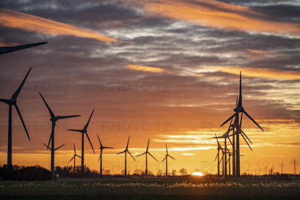 Wind farm near the East Frisian town of Norden, east of the town, sunset, Lower Saxony, Germany, Europe