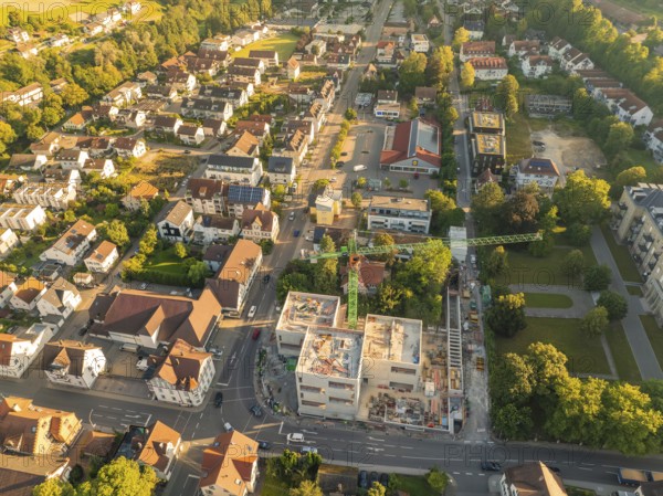 Aerial view of an urban area with an active construction site and many surrounding buildings, Nagold, Black Forest, Germany, Europe