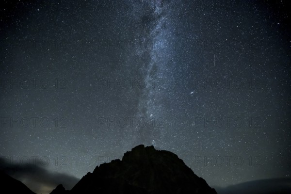 Milky Way and starry sky with Montafon mountains, Tschagguns, Rätikon, Montafon, Vorarlberg, Austria, Europe