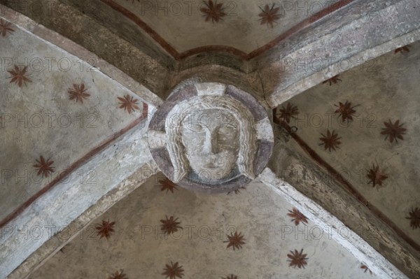 Head of Christ, in the cross-ribbed vault, chancel of the Romanesque St Michael's Church, Michaelsberg, Cleebronn, Baden-Württemberg, Germany, Europe