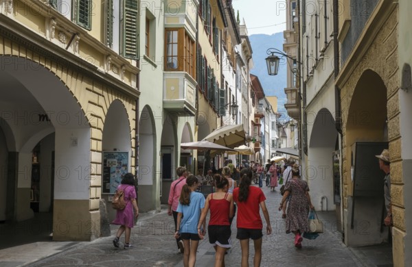 Merano, South Tyrol, Italy, passers-by stroll through the Laubengasse, the arcades are the heart of the old town centre, Europe