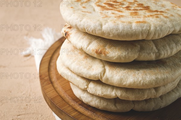 Pita bread, stack, on the table, no people