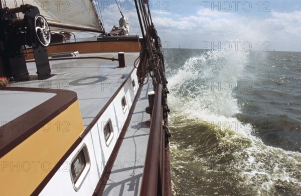 Clipper sailing on the Wadden Sea, the Netherlands