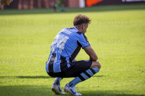 Football 3rd division, season 2024/25, matchday 4: Waldhof Mannheim against 1. FC Saarbrücken. Picture: Lukas Klünter (24, Mannheim) exhausted and sad after the 1-0 defeat