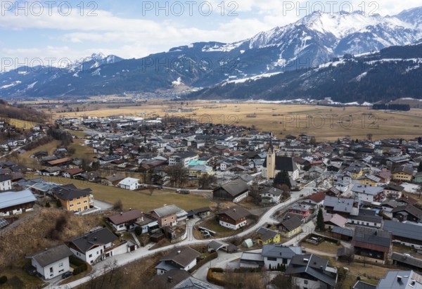Drone shot, view of village with parish church, Piesendorf, Pinzgau, Salzburg province, Austria, Europe