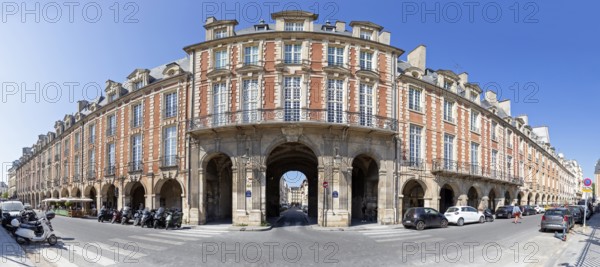 Impressive building with arcades at a crossroads, Paris