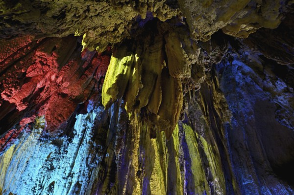 Stalactites illuminated by coloured LED light, stalactite cave, Höllgrotten, Baar, Canton Zug, Switzerland, Europe